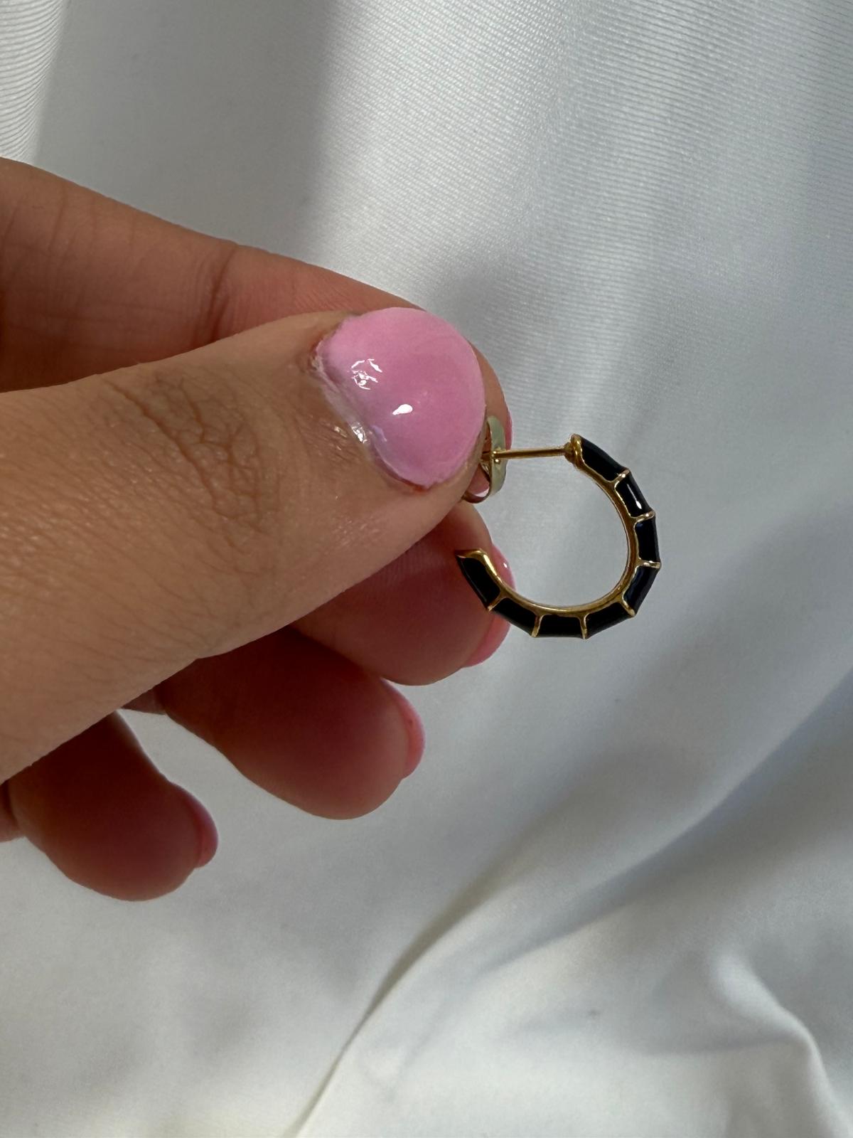 Black hoops with gold stripes