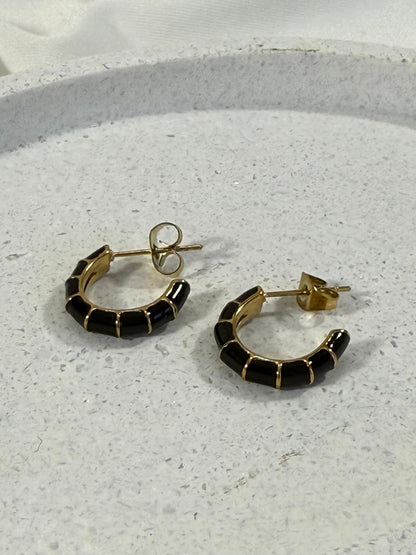 Black hoops with gold stripes