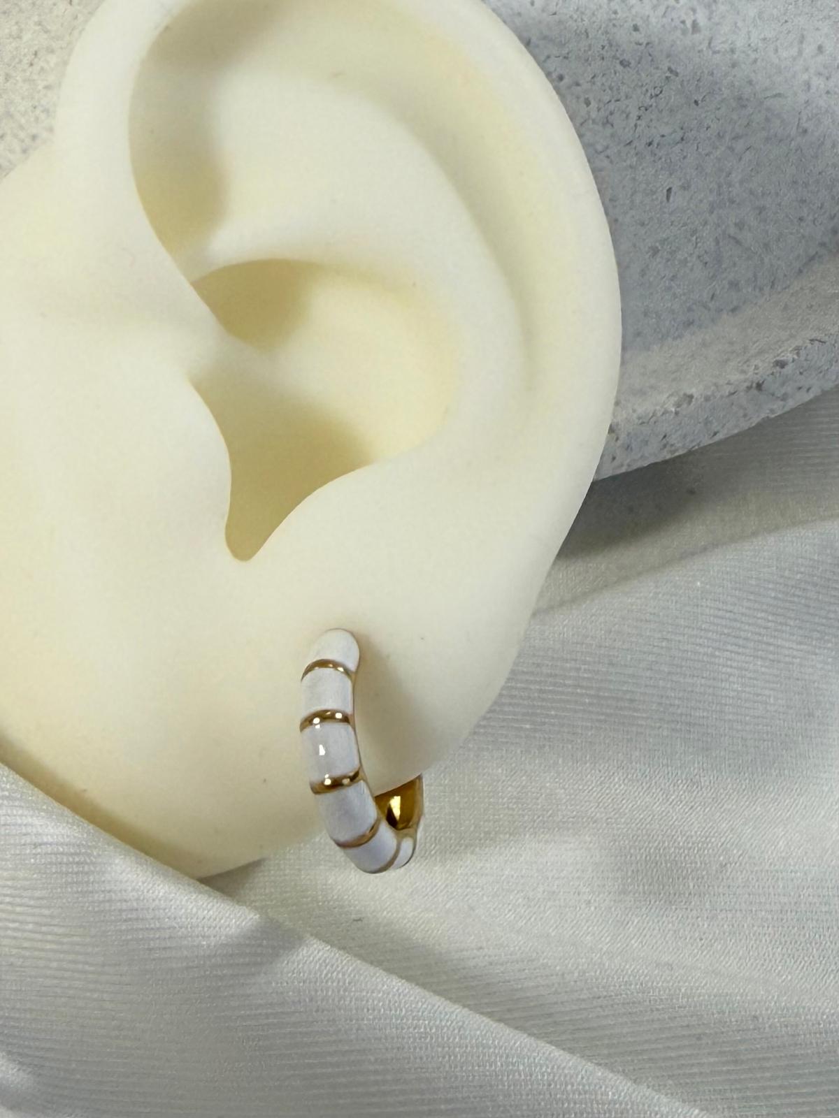 White hoops with gold stripes